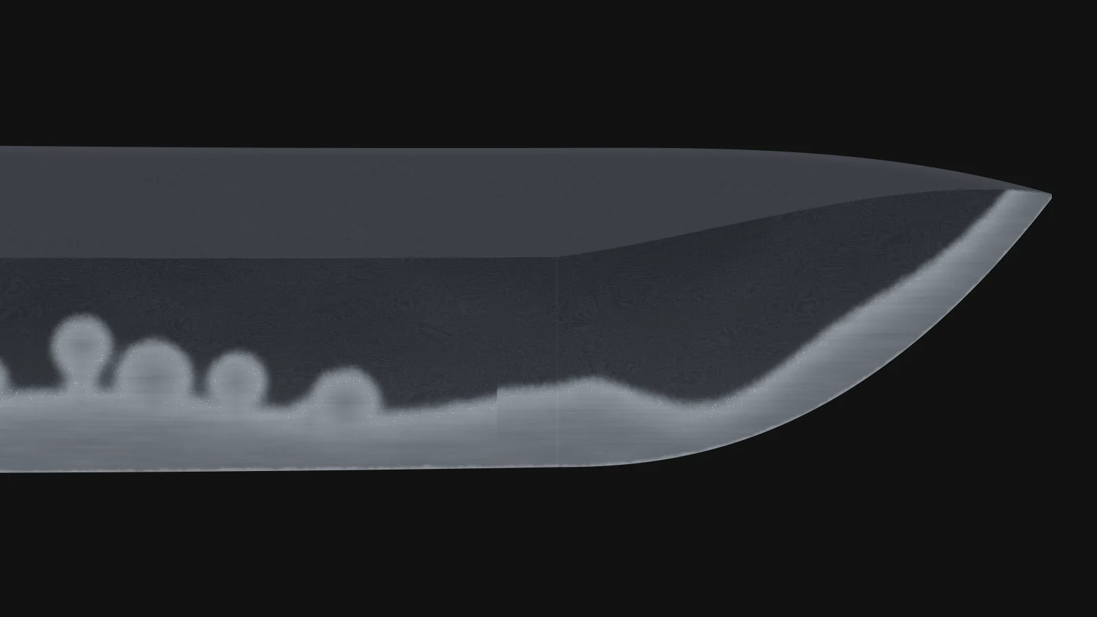 Jizuya: Harder slivers for the ji. The grain sharpens and the chikei begin to catch light.