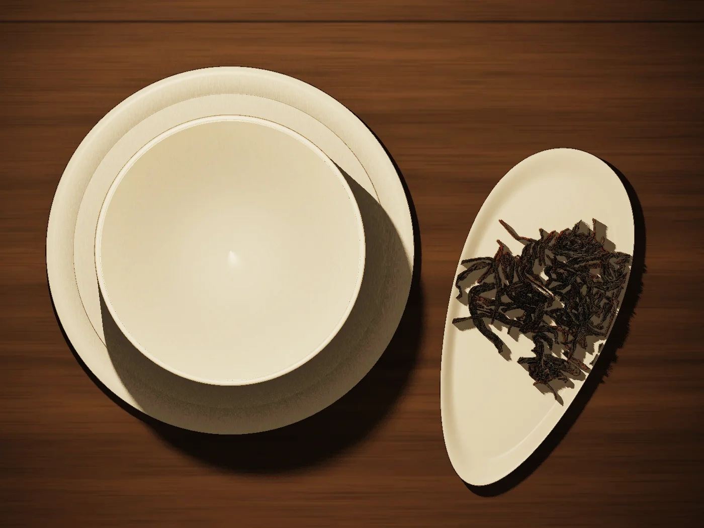 An empty white gaiwan beside a dish of dry, dark Dancong leaves