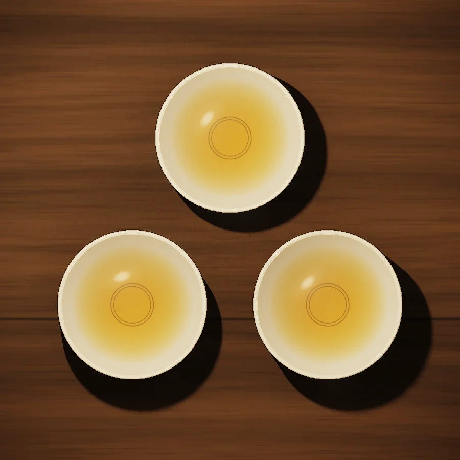 Three thin white cups of tea seen from above