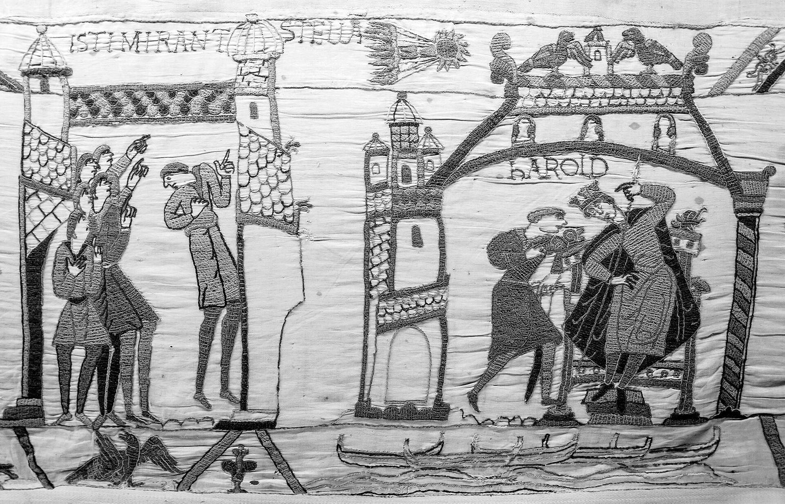 Section of the Bayeux embroidery: a group of men point up at a star with a flaming tail; beside them Harold sits enthroned.
