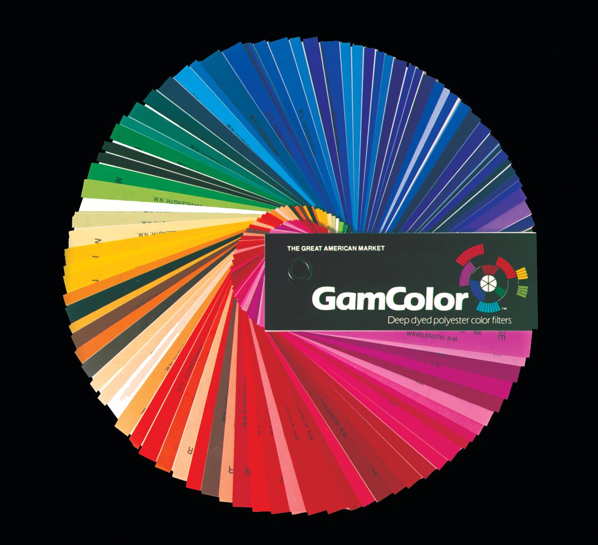 A GAMColor swatch book fanned open into a full circle of filter samples