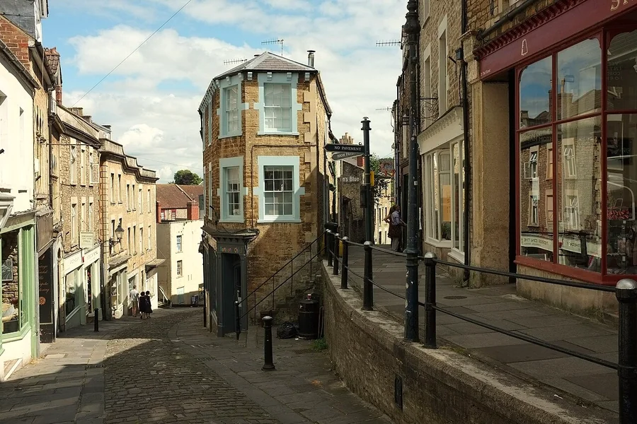 Catherine Hill in Frome: a cobbled street of stone houses and small shopfronts running downhill.