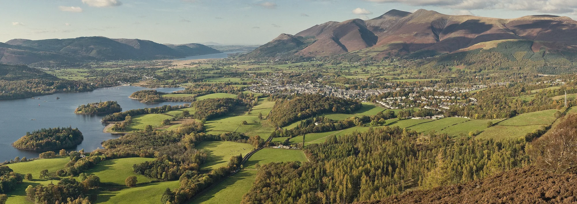 Keswick and Derwentwater seen from the fells, the town in the valley below Skiddaw
