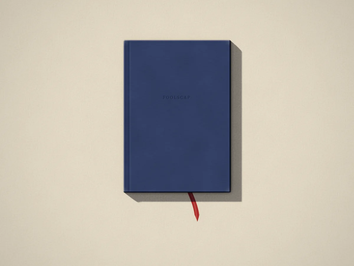 Askew notebook, plain, photographed on the counter