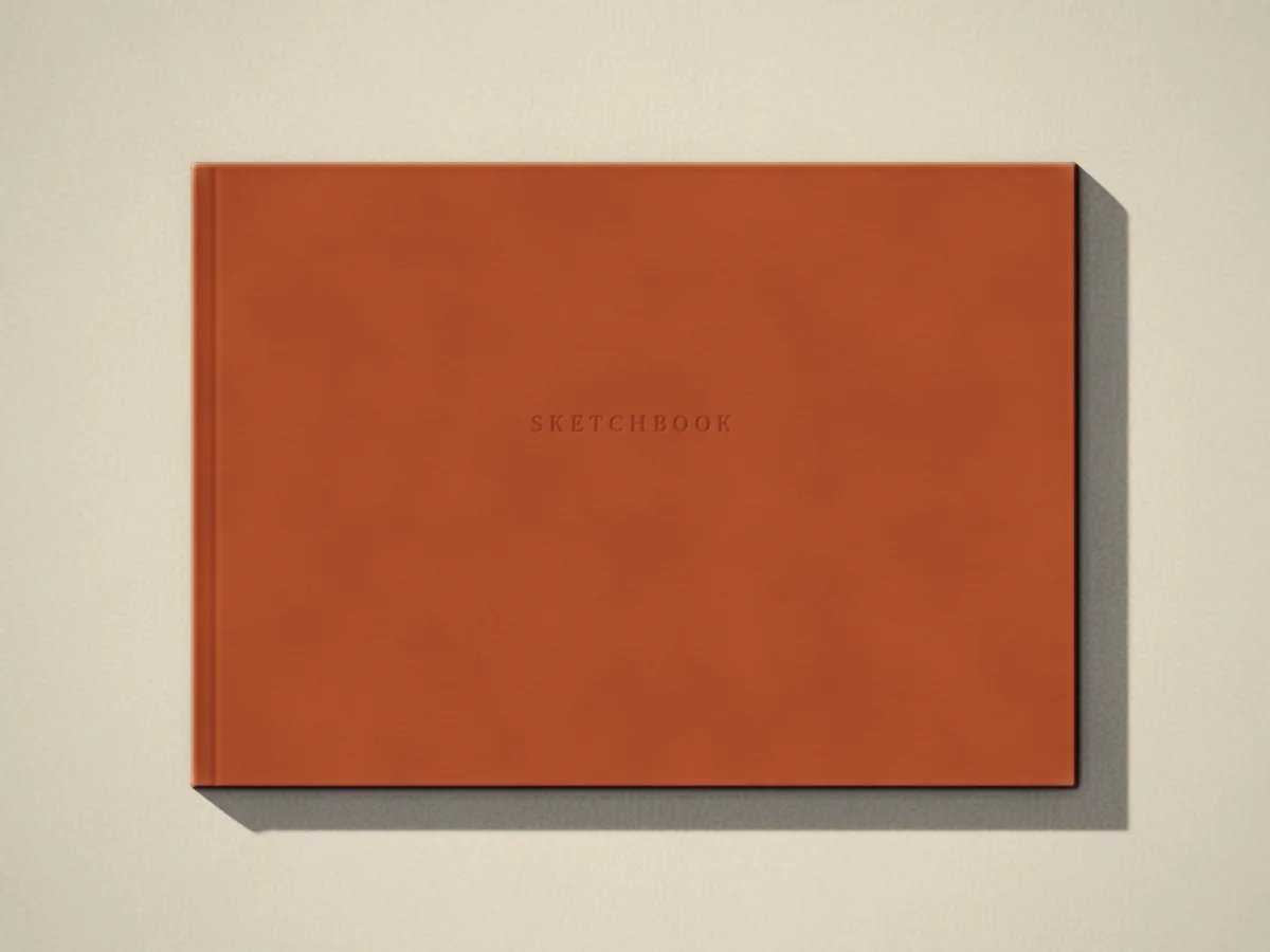 Sketchbook, photographed on the counter