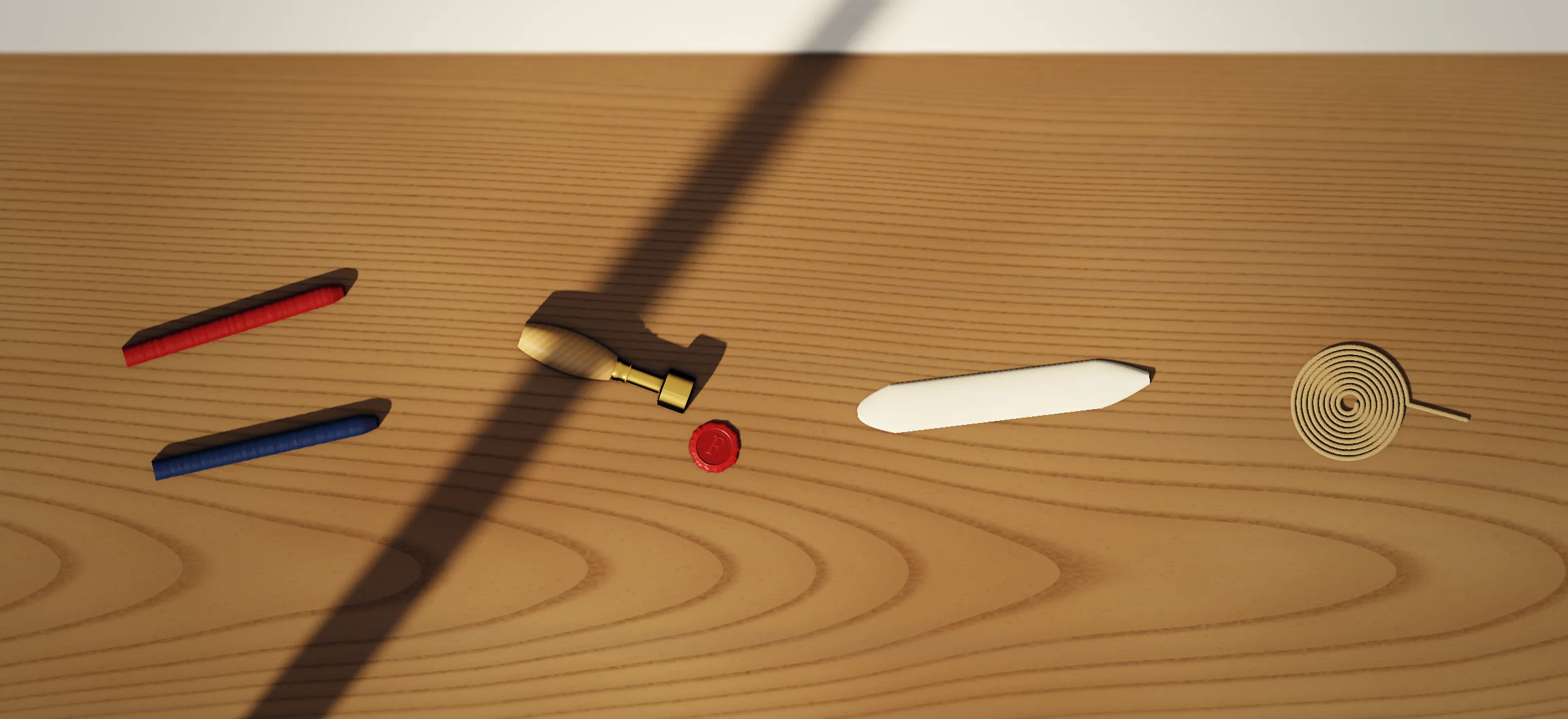 Desk and post on the shelf: sealing wax, brass seal, initial, bone folder, jute twine
