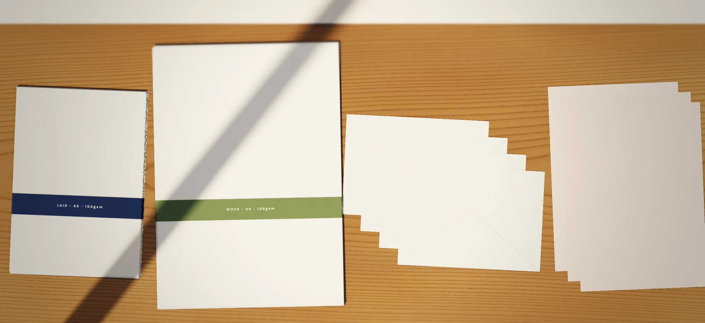 Paper and envelopes on the shelf: laid writing paper, wove writing paper, laid envelopes, blotting paper
