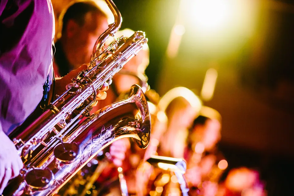 Saxophones under warm stage lights