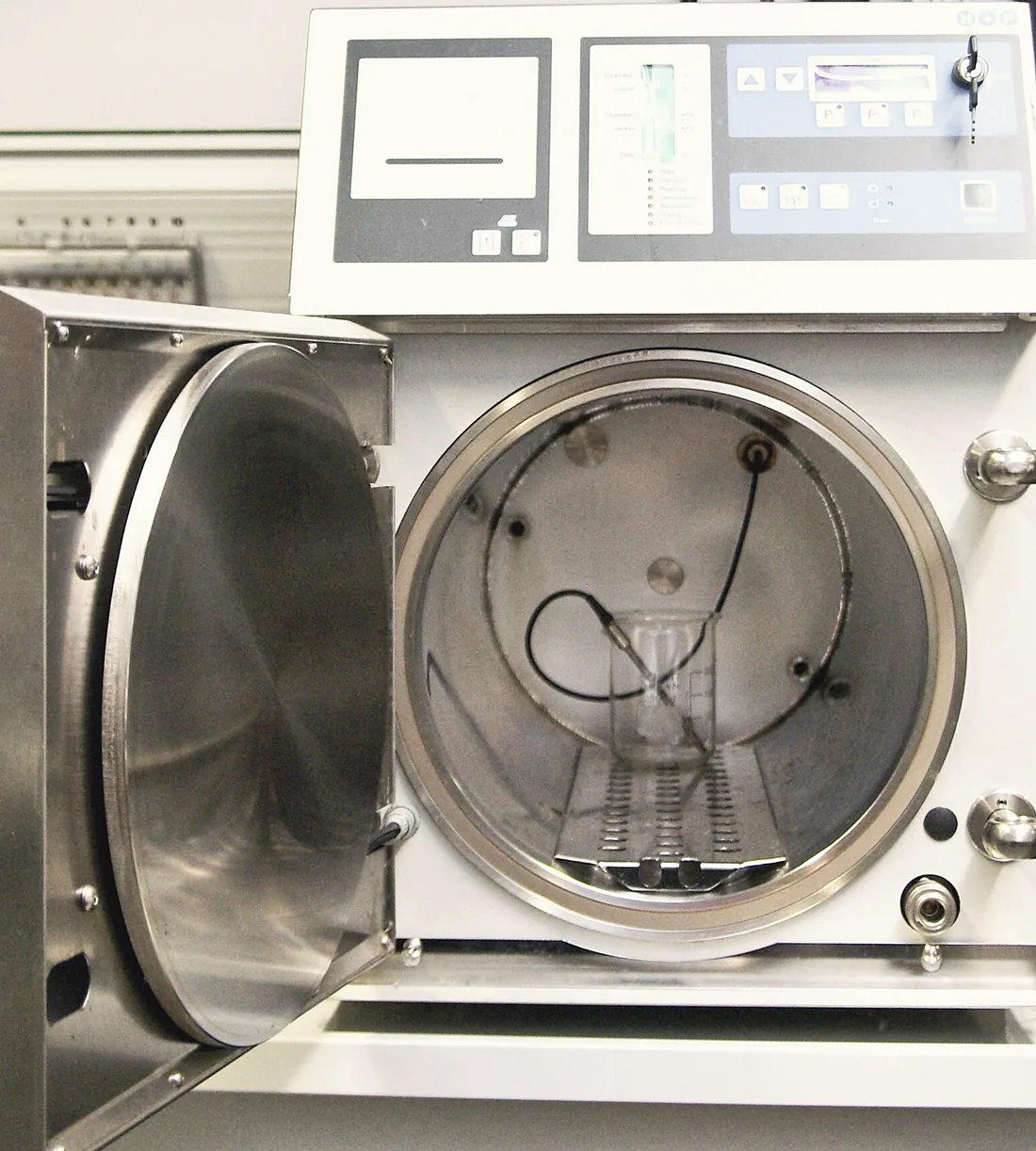 The steam steriliser in the decontamination room, door open