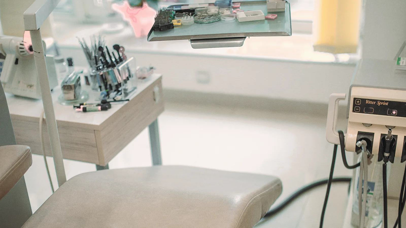 A treatment room in daylight, the chair turned towards the window