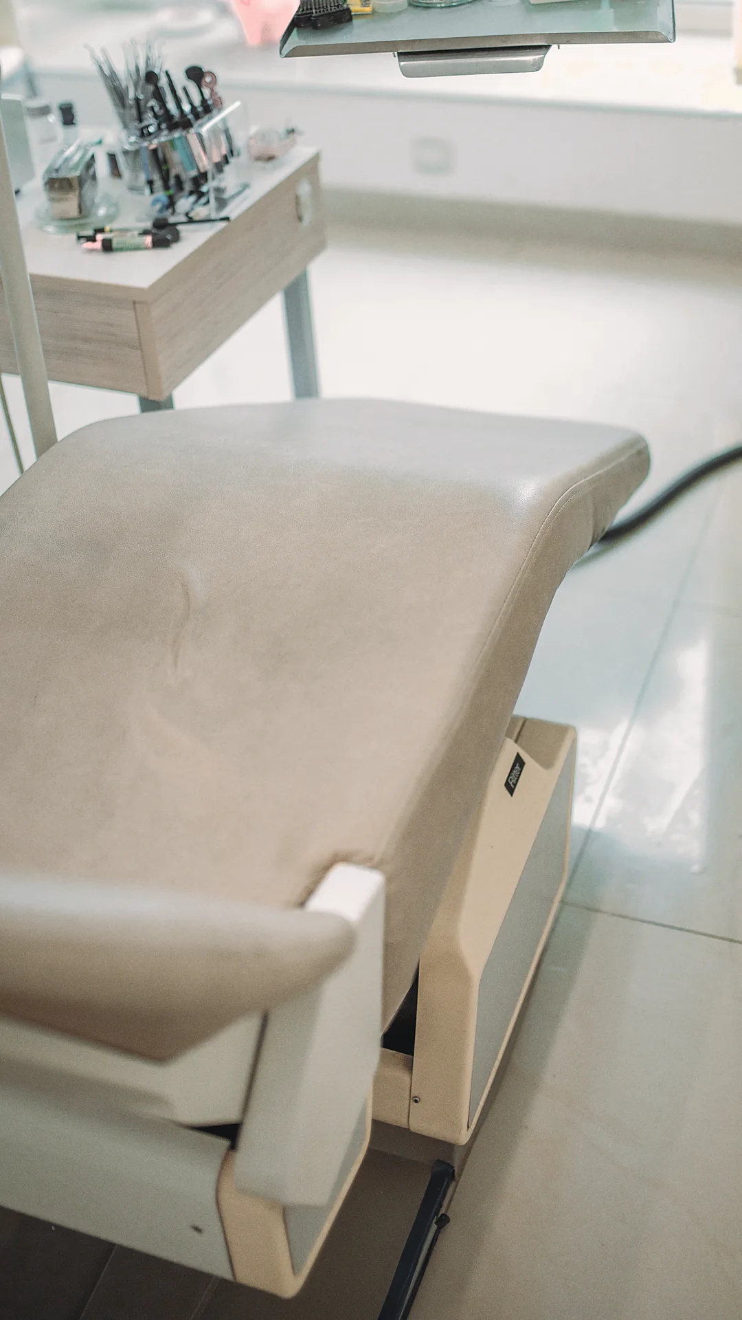 A treatment room in daylight, the chair turned towards the window