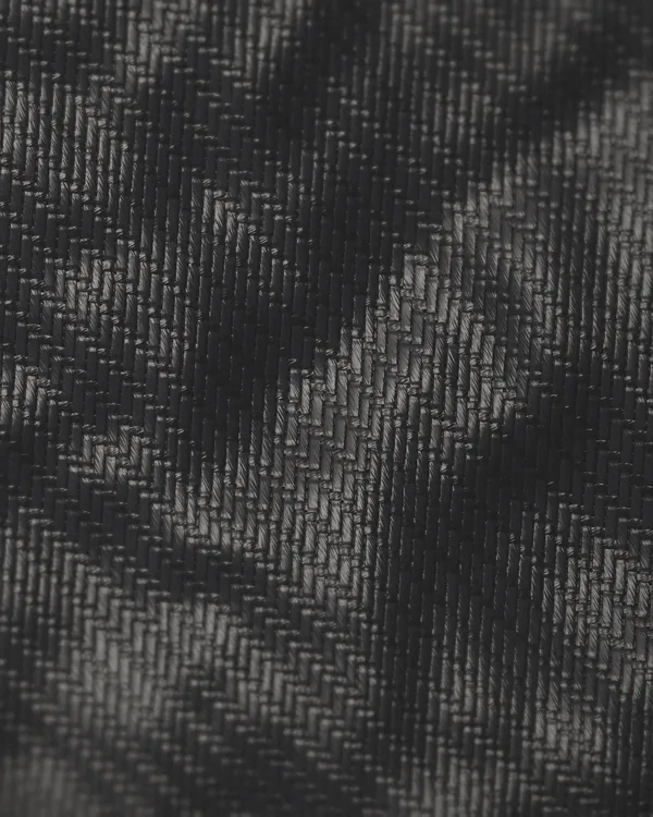 The cloth of No. 07 seen close: black cotton twill