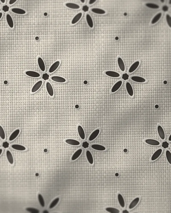 The cloth of No. 14 seen close: white cotton broderie