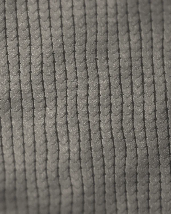 The cloth of No. 02 seen close: grey marl lambswool