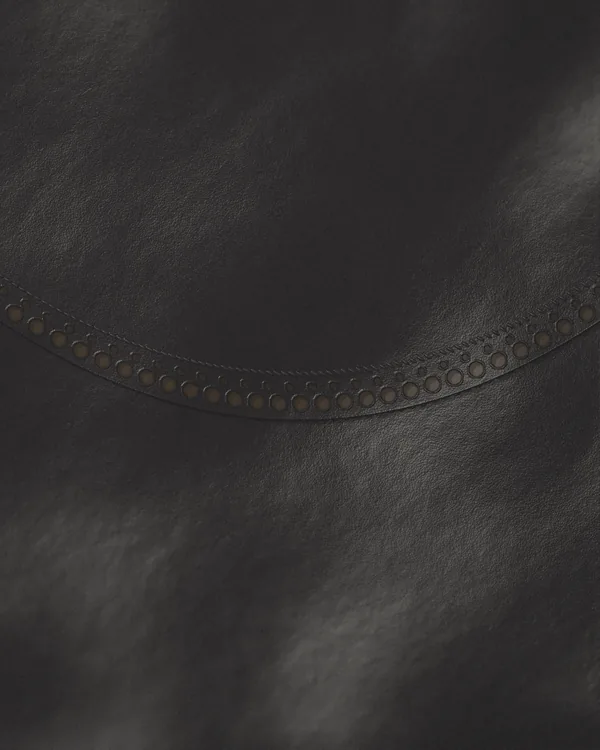 The cloth of No. 15 seen close: black grain calf, goodyear-welted