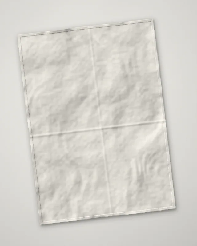 An itajime tea towel, folded open, before its first dip