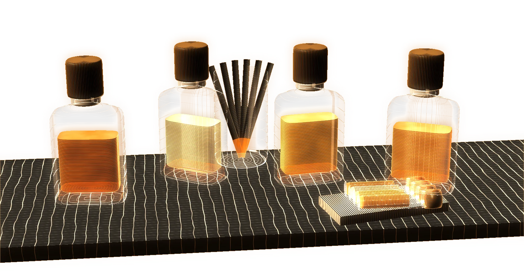 The boutique counter: the four perfumes open, a glass of blotters and the tray of sample vials