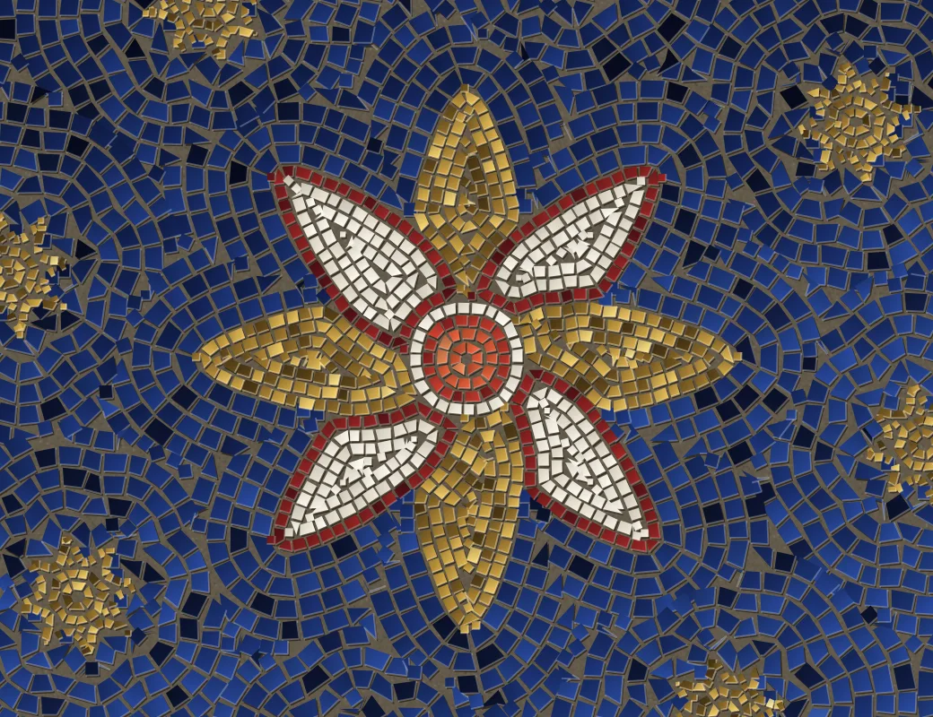 The rosette: gold and marble petals, a cinnabar heart